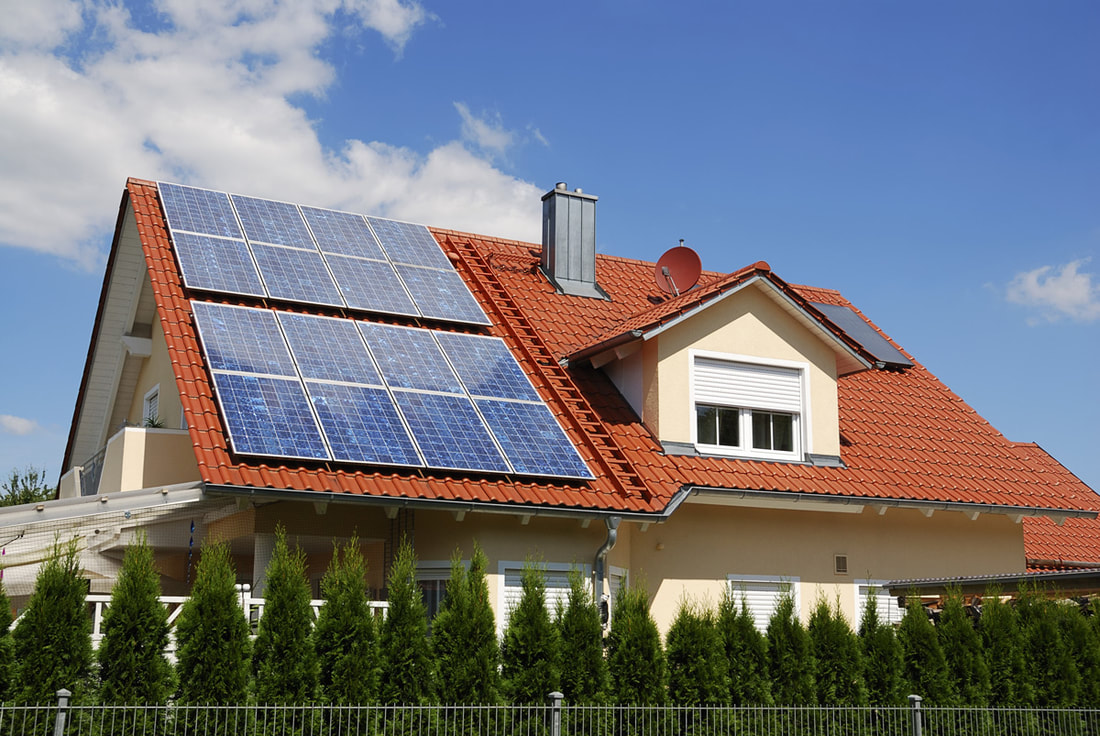 comparing-roof-and-ground-mounted-solar-panels_orig